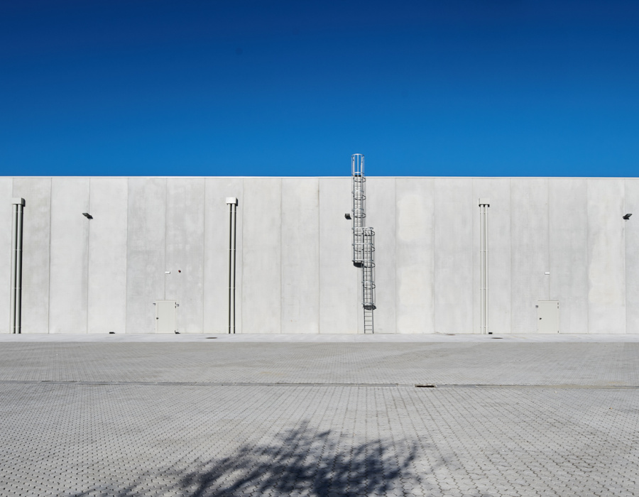 Pavilux®, industrial floor, concrete color. Zignago Vetro, Fossalta di Portogruaro (VE). Project: Zeno Pucci + Architects