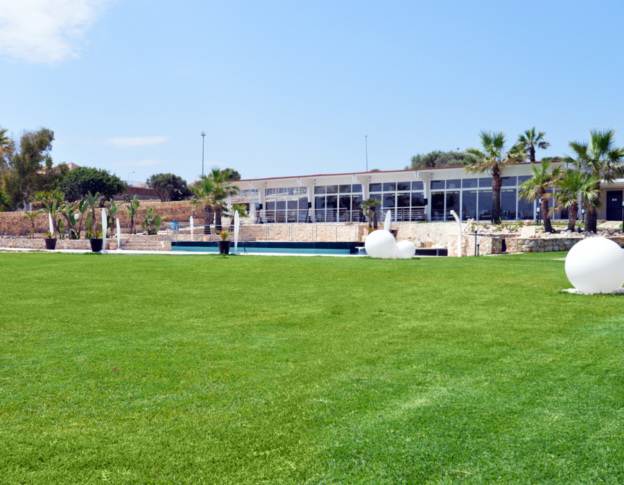 Plam Stampable, stamped concrete floor white color, tawny shades. Hotel Capo Campolato, Siracusa, Italy