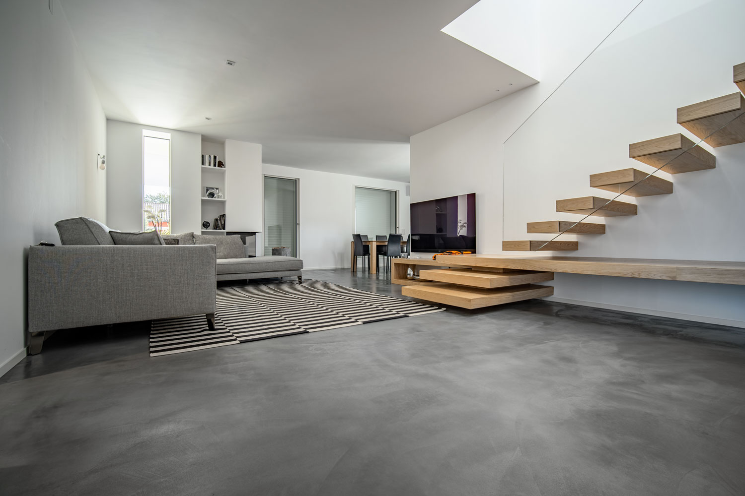Microverlay - piso de concreto de resina de bajo espesor - apartamento privado - Studio Stocco Architetti